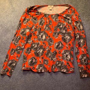 Red empire waist top with gray flowers